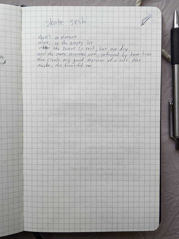 page of a notebook with messy handwriting